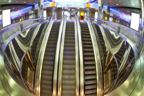 Moving escalators Stock Photos
