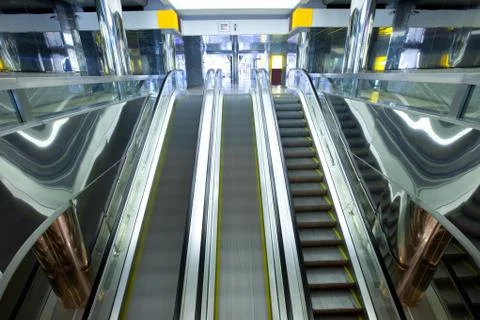 Moving escalators Stock Photos
