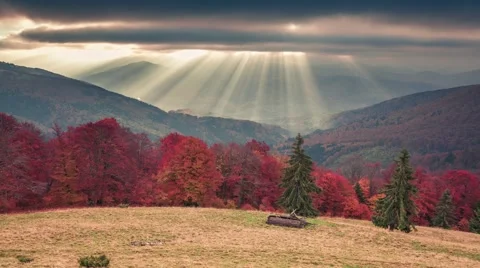 Moving first sunlight between rainy clouds Stock Footage 58587287