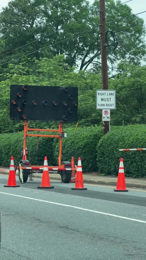 Moving flashing lights arrow directional traffic sign Stock Footage 276572622