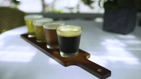 Moving in on a flight of four beers Stock Footage 131529459