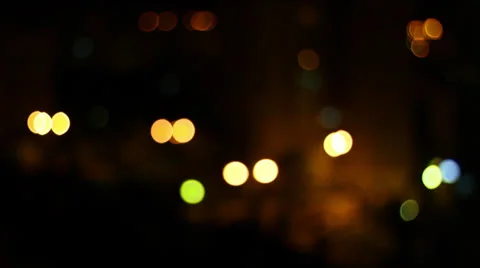 Moving focus from blur to building at night Stock Footage 25848296
