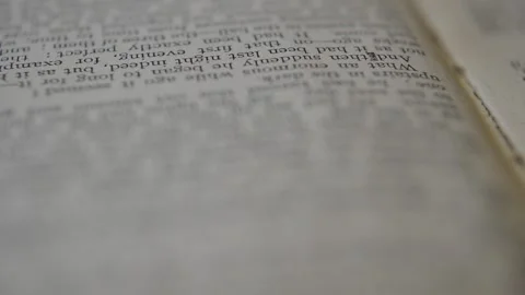 Moving focus on the words in the book. close up words on book. 스톡 동영상 224513716