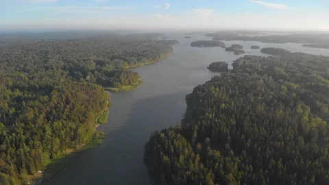 Moving forward above the river and forest near Helsinki Stock Footage 110839460