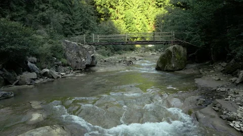 Moving forward above the river in mountains Stock Footage 185587582