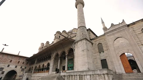 Moving forward along of a mosque outside Stock Footage 100287913