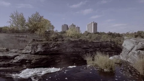 Moving forward and look down on waterfall - Aerial drone shot Stock Footage 115352715