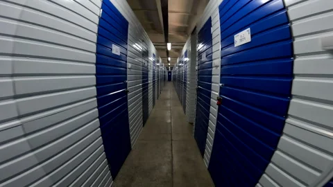 Moving forward by corridor in storage Stock Footage 253168561