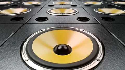 Moving forward over audio speakers with yellow membranes playing modern music Stock Footage 122050284