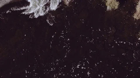  Moving forward over a waterfall - Aerial drone shot  Stock Footage 115352933