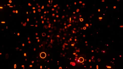 Moving forward past many rings flashing red orange light on a black background.  Stock-Footage 311359259