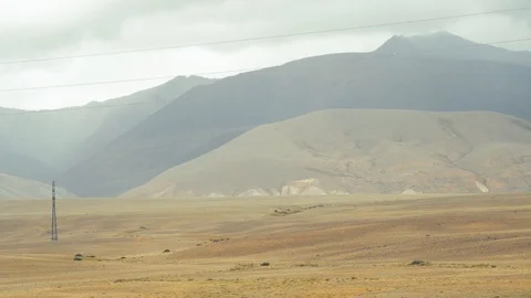 Moving forward to pine woods forest and mountain valley with sun flare in summer Video stock 93200473