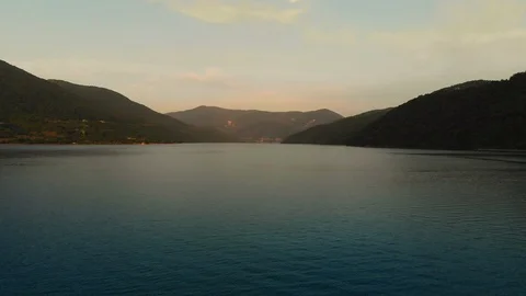 Moving forward to woods forest and mountain valley with sun flare in summer day. Stock-Footage 114669008