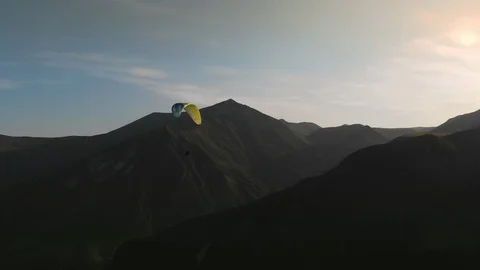 Moving forward to woods forest and mountain valley with sun flare in summer day. Video stock 114674990