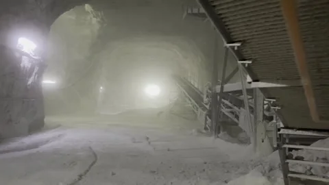 A moving frame with equipment operating in a salt mine 動画素材 301040916