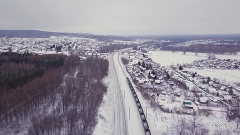 Moving freight train in the countryside at winter (time-lapse) Stock Footage 122756385