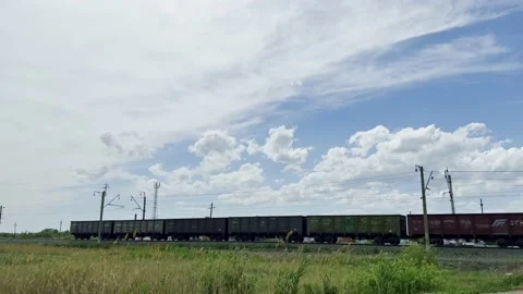 A moving freight train from a large number of containers delivers cargo. Stock-Footage 199104644