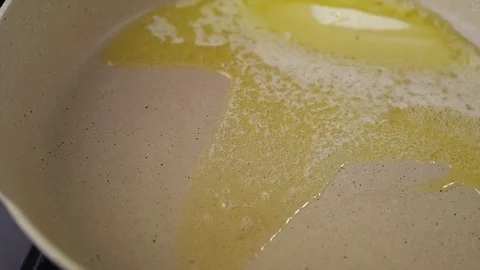 Moving frying pan  Stock Footage 128639154