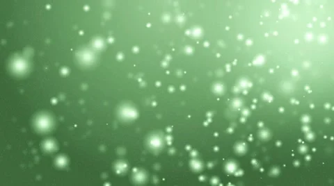Moving gloss particles on green backgrou... | Stock Video | Pond5