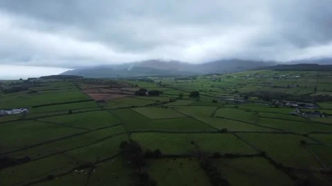 Moving Green fields towards Mourne Mountains Stock Footage 317541789