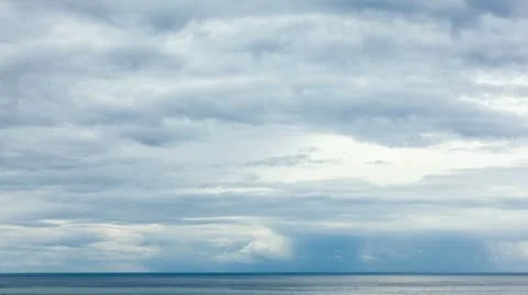 Moving grey clouds over sea horizon time lapse Stock Footage 11129361
