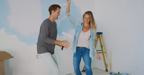 Moving to the grooving while homeimproving Stock Footage 101753585