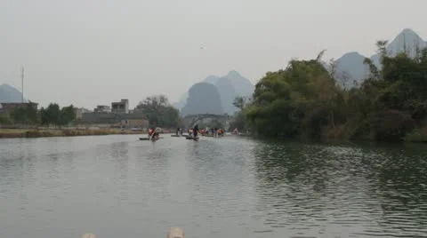 Moving Guilin China floating down river on bamboo raft  beautiful mountain Stock Footage 22330463