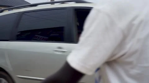 A moving hawker in Lagos Video stock 248947548