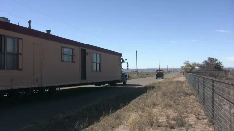 Moving a House Trailer Down the Road Stock Footage 561317