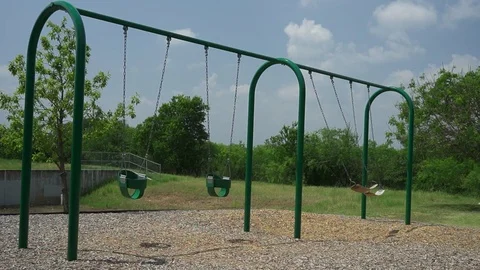 Moving kids swing set Vídeos de archivo 75433690