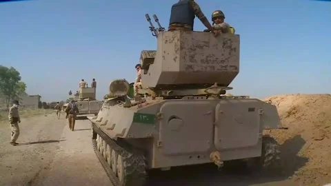 Moving Kurdish peshmerga units and a column of armored vehicles Stock Footage 172158237