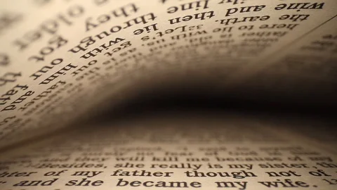 Moving laterally through a book left to right, pages on top &amp; bottom of Stock Footage 116102830