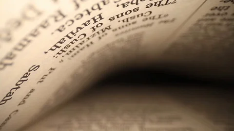 Moving laterally through a book left to right, pages on top &amp; bottom of Stock Footage 116102834