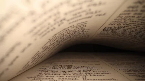 Moving laterally through a book left to right, pages on top &amp; bottom of Stock Footage 116102855