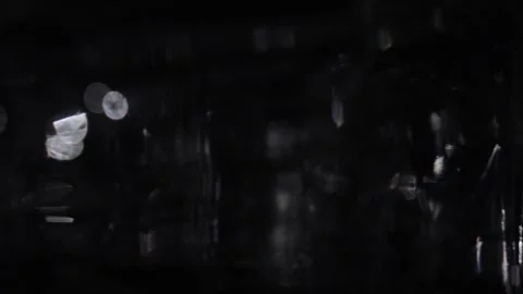 Moving to the left Abstract bokeh in black Stock Footage 318590792