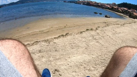 MOVING LEGS IN THE BEACH Stock Footage 92639933
