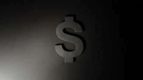 Moving light illuminates US dollar symbol Видео 97092998