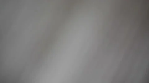 Moving light projection on white wall background Stock Footage 239528525