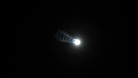 Moving light source with star shapes in dark background Stock Footage 338995710