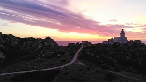  moving lighthouse panorama during sunset  Stock Footage 128709670