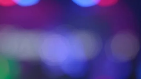 Moving lights blur 4k fast. Middle size multicolored defocused lights background Stock Footage 71707695