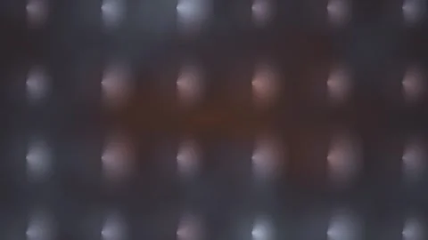 Moving lights show different patterns across a dark Stock Footage 339297150