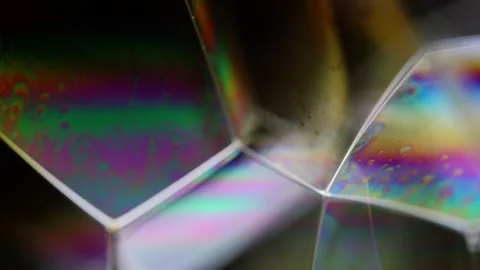 Moving liquid geometry with shifting iridescent light refraction Stock Footage 334109768