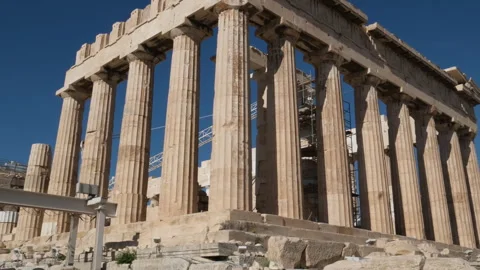 Moving a long a colonnade from the ancient Temple of Hephaestus in Ancient Agora Stock Footage 301299828
