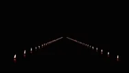 Moving Into A Long Path Of Candles In The Dark Stock Footage