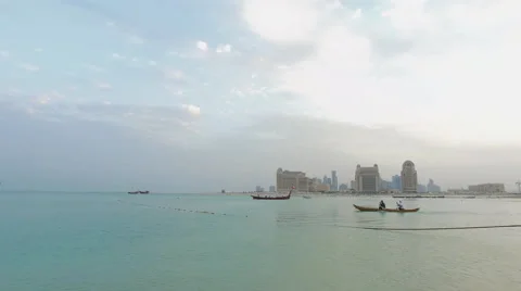 Moving long shot for a small boat in the beach Stock Footage 57296461