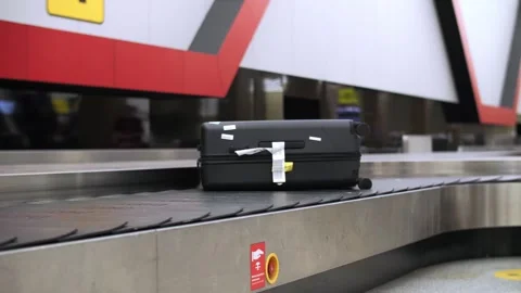 Moving luggage carousel with suitcase Stock Footage 292387746