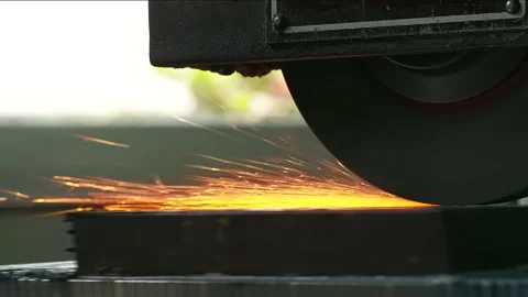 Moving machine device polishes some metal surface with a stream of sparkle. Stock Footage 246954831