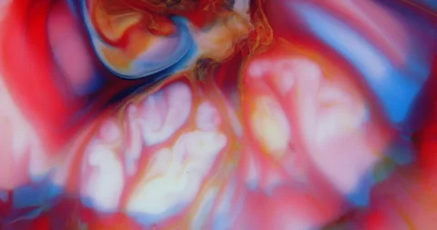 Moving marble texture background. Fluid art of flowing red, blue and yellow colo Stock Footage 284034555