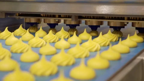 Moving marshmallows along a conveyor line. Stock Footage 165437016